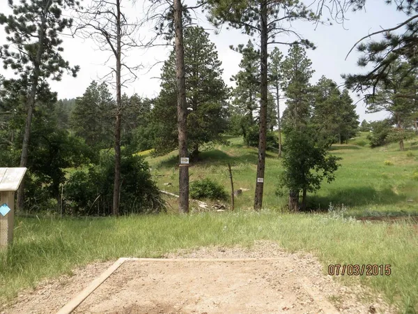 Spearfish Canyon DGC: Hole 7 · Tee pad · Jul 2015, photo by Vey Thach