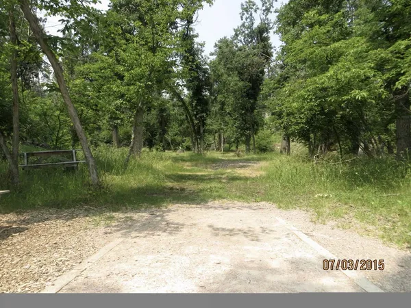 Spearfish Canyon DGC: Hole 5 · Tee pad · Jul 2015, photo by Vey Thach